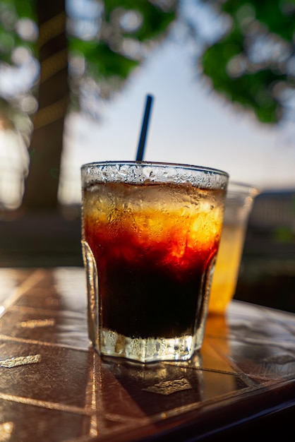 Delicious ice coffee americano on table