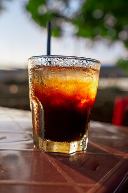 Delicious ice coffee americano on table