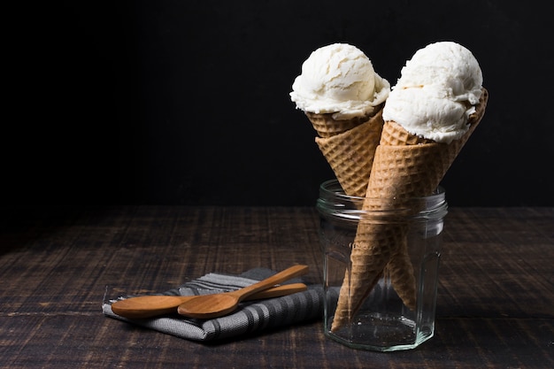 Delicious ice cream cones with vanilla