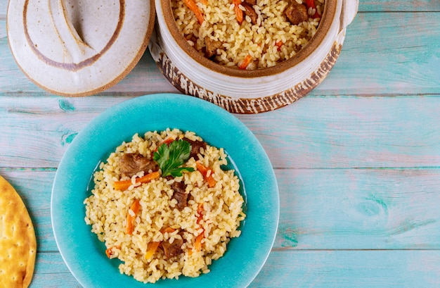 Delicious indian lunch with stewed rice ,meat and carrot