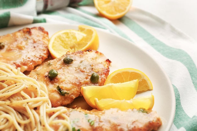 Delicious Italian chicken piccata on plate