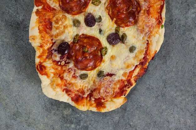 Delicious italian pizza served on grey background