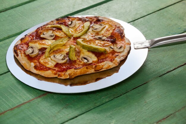 Delicious italian pizza served on pizza peel