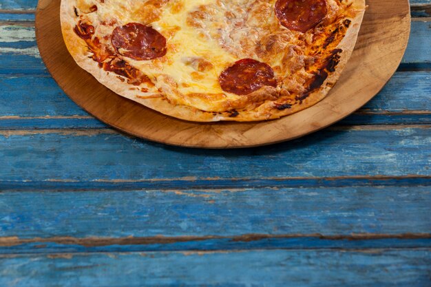 Delicious italian pizza served on pizza tray