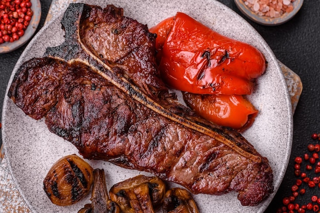 delicious juicy beef tbone steak with salt spices and herbs