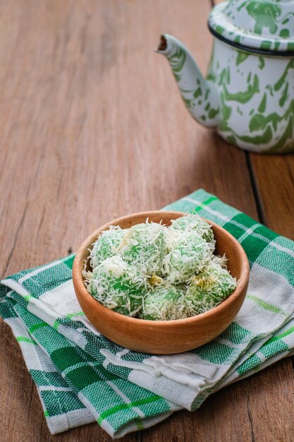 Delicious klepon traditional indonesian culinary over wooden table