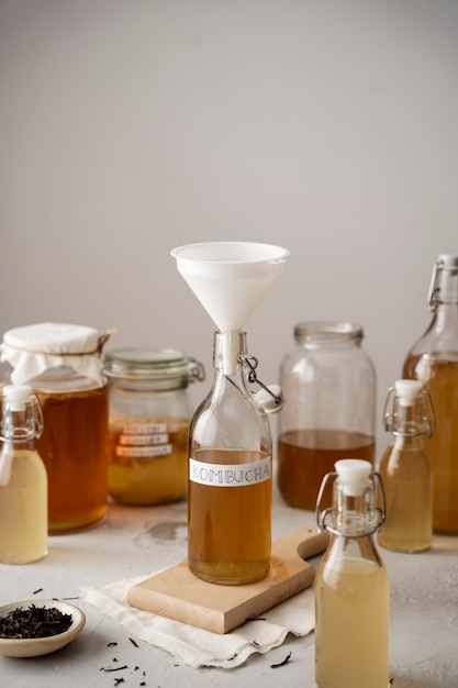 Delicious kombucha bottle on table