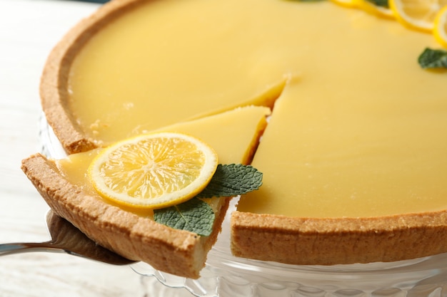 Delicious lemon tart and spatula, close up