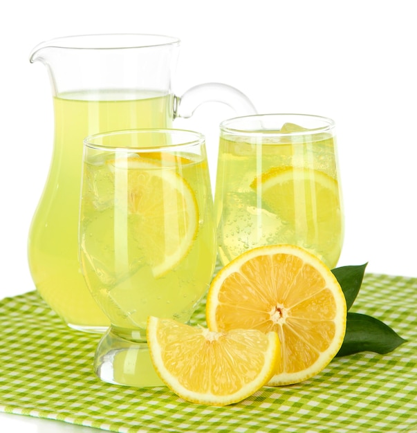 Delicious lemonade on table on white background