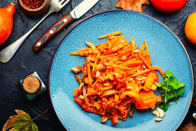 Delicious meat salad with pumpkin