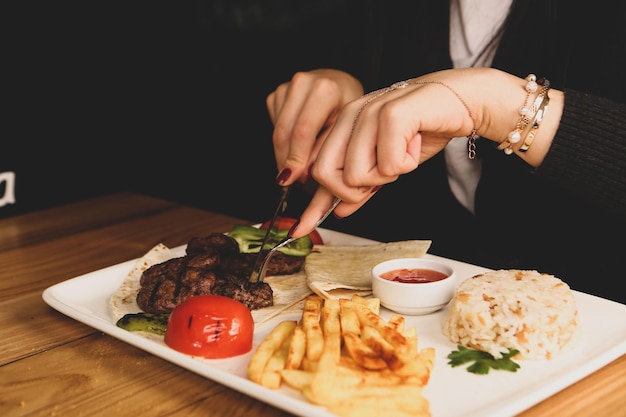 Delicious meatballs with french fries