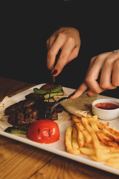 Delicious meatballs with french fries