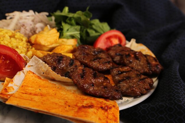 Delicious meatballs with french fries