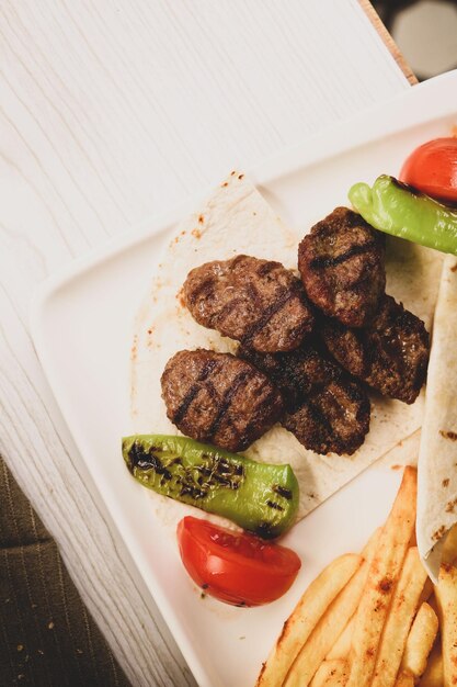 Delicious meatballs with french fries