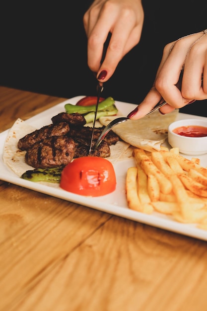 Delicious meatballs with french fries