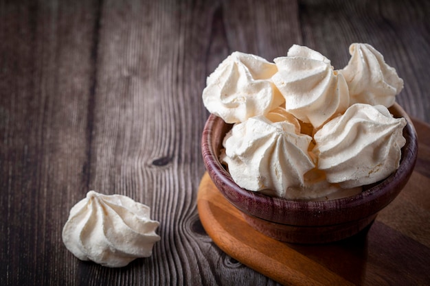 Delicious meringue cookies on the table