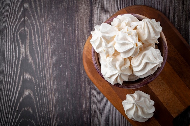 Delicious meringue cookies on the table