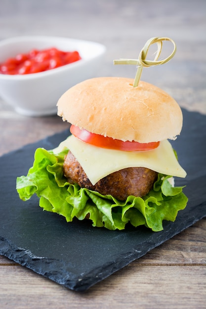 delicious mini cheese burger with vegetables