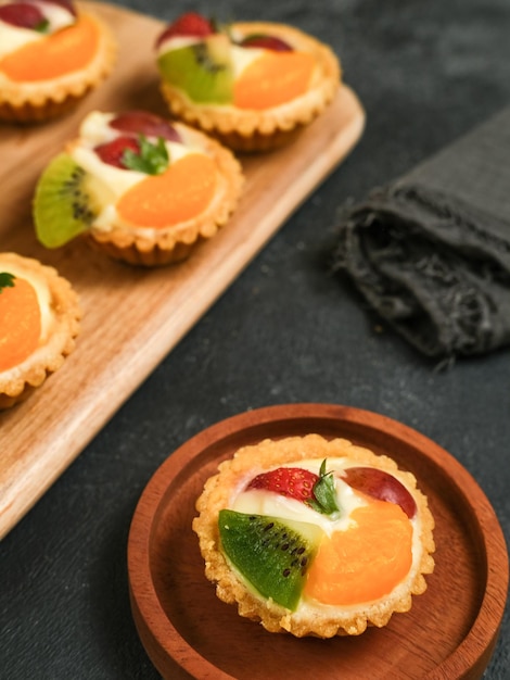 Delicious mini pie with fresh fruits Selected focus