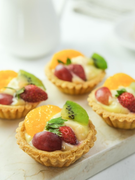 Delicious mini pie with fresh fruits Selected focus