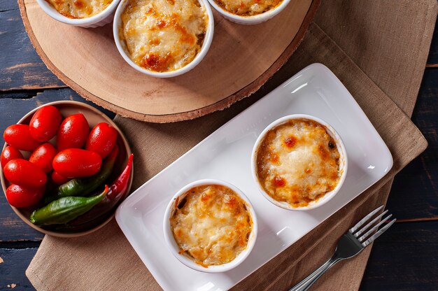 Delicious mini shepherds pie in white bowls