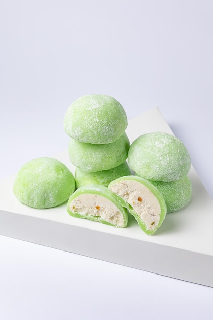 Delicious mochi on a white background, close-up. Traditional Japanese dessert