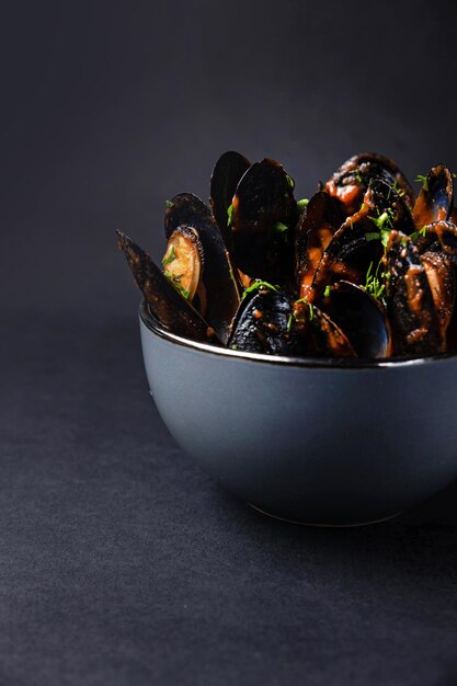 delicious mussels cooked in sauce.