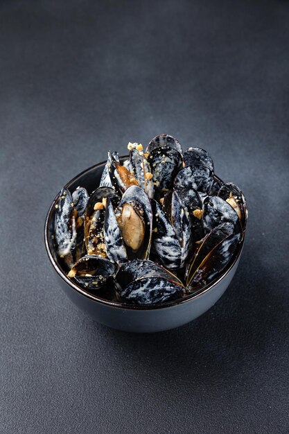 delicious mussels cooked in sauce.