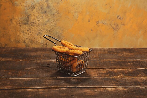 Delicious onion rings  on the table