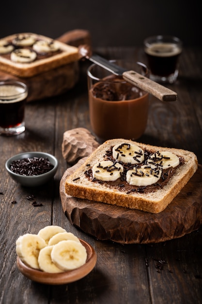 Delicious open sandwich with chocolate and banana