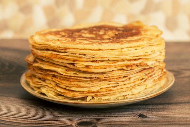 Delicious pancakes with chocolate sauce fresh blueberries on a rustic wooden table rustic brown tabl