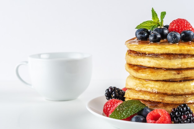 Delicious pancakes with fresh berries