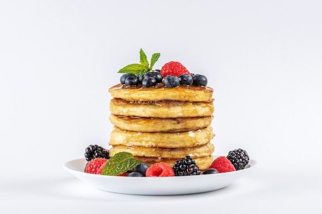 Delicious pancakes with fresh berries