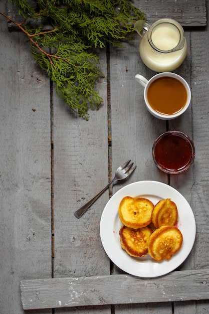 delicious pancakes with jam on the table