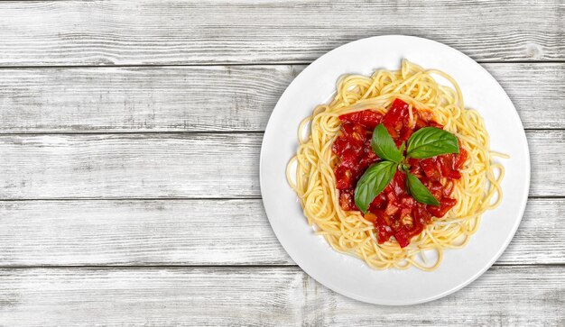 Delicious pasta on white plate on  background