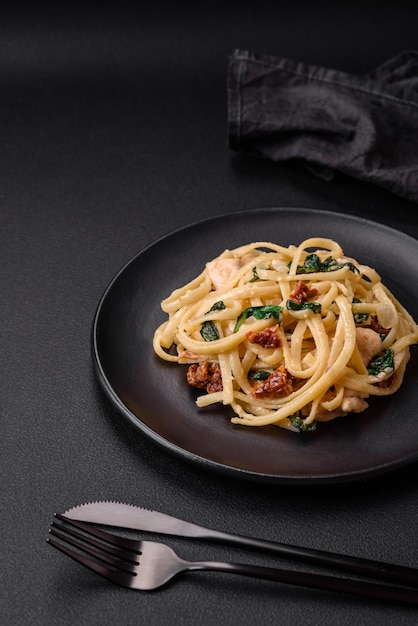 Delicious pasta with spinach sun dried tomatoes cheese onions