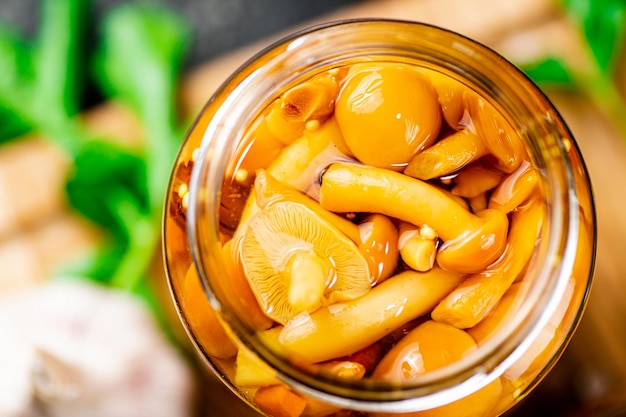 Delicious pickled mushrooms Macro background