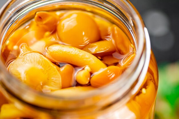 Delicious pickled mushrooms Macro background