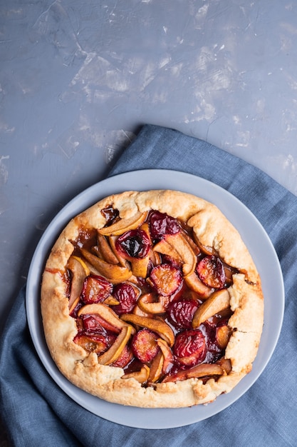 Delicious pie with plums and pears