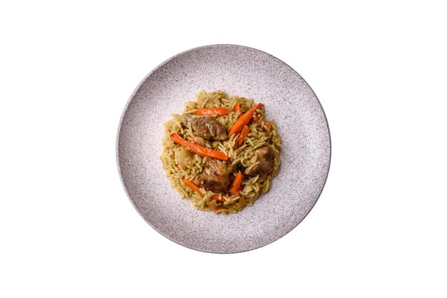 Photo delicious pilaf with vegetables salt spices and herbs in a ceramic plate