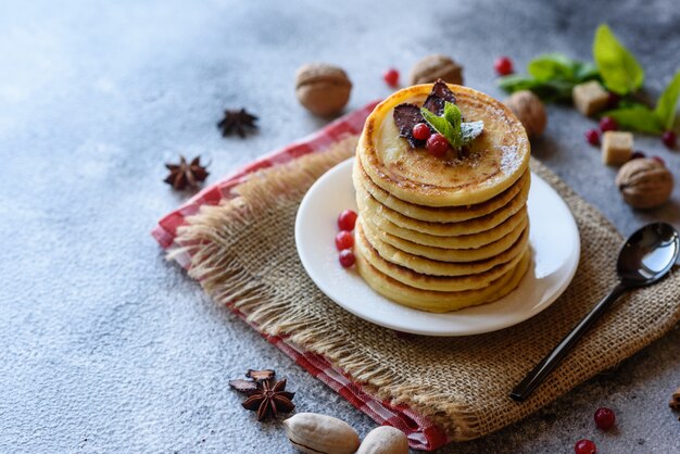 Delicious pile of pancakes on a plate