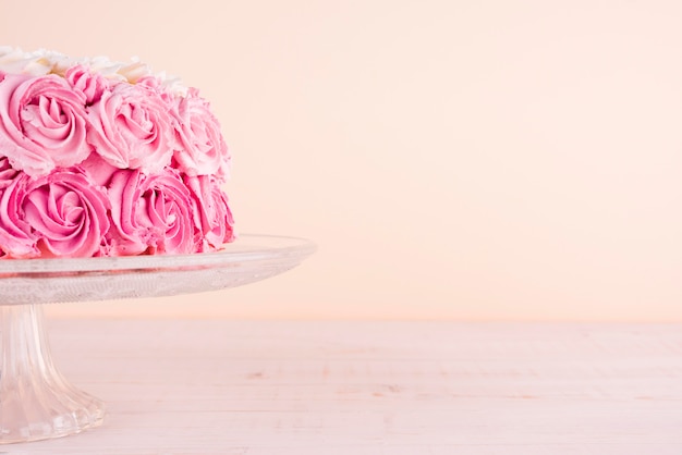 Delicious pink cake on stand