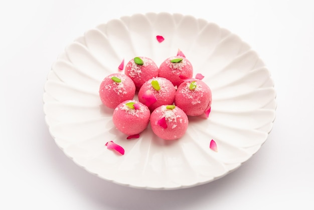 Delicious Pink Chumchum or rose flavour cham cham or Rasgulla or Rasagola Rosogola Rosogolla