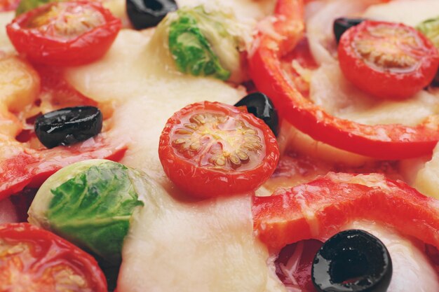 Delicious pizza with cheese and vegetables