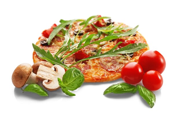 Delicious pizza with vegetables and herbs isolated on white