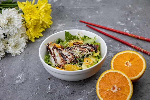 delicious poke with eel avocado and orange in the restaurant