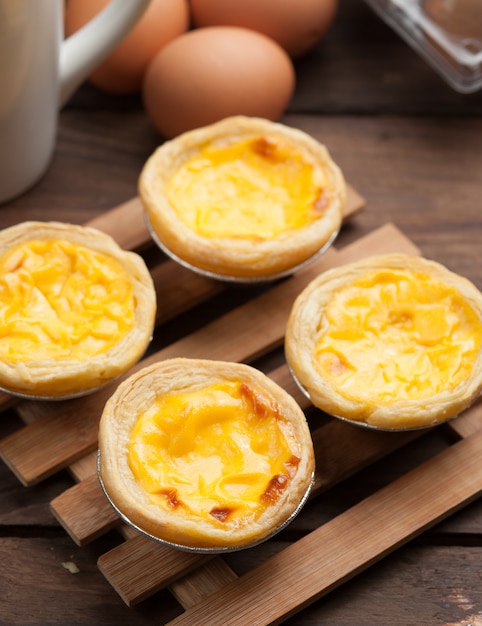 delicious portuguese egg tart on wood background