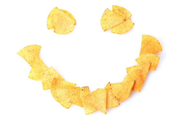 Delicious potato chips smile shape isolated on white