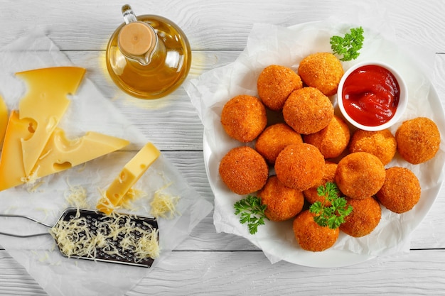 Delicious potato croquettes with grated mozzarella cheese seasoned with spices