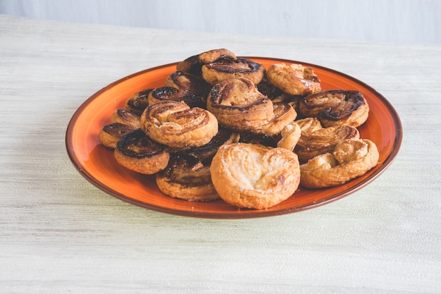 Delicious puff pastries in the shape of hearts